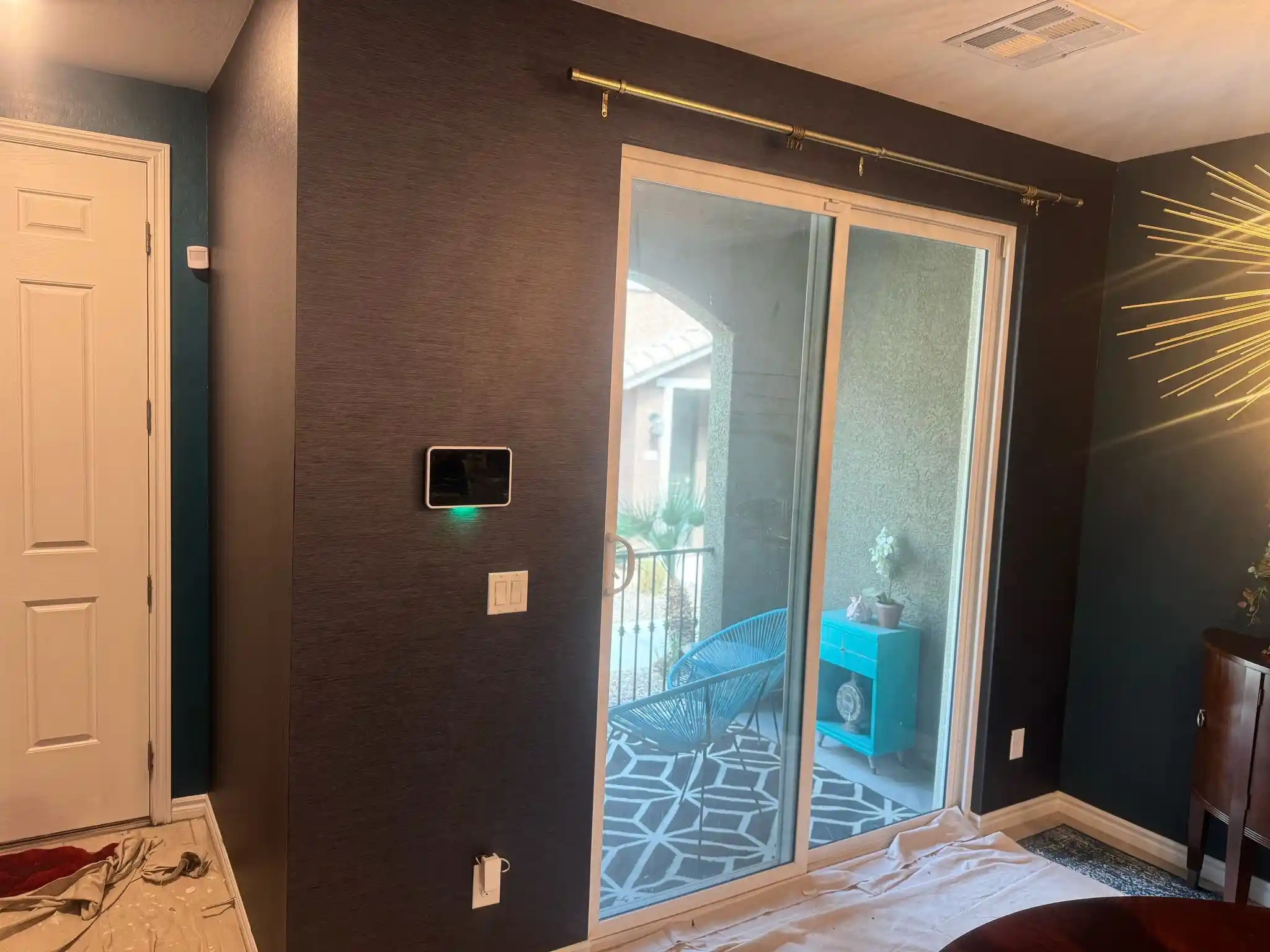 Evaluating a room for wallpaper installation in Medical City, Orlando